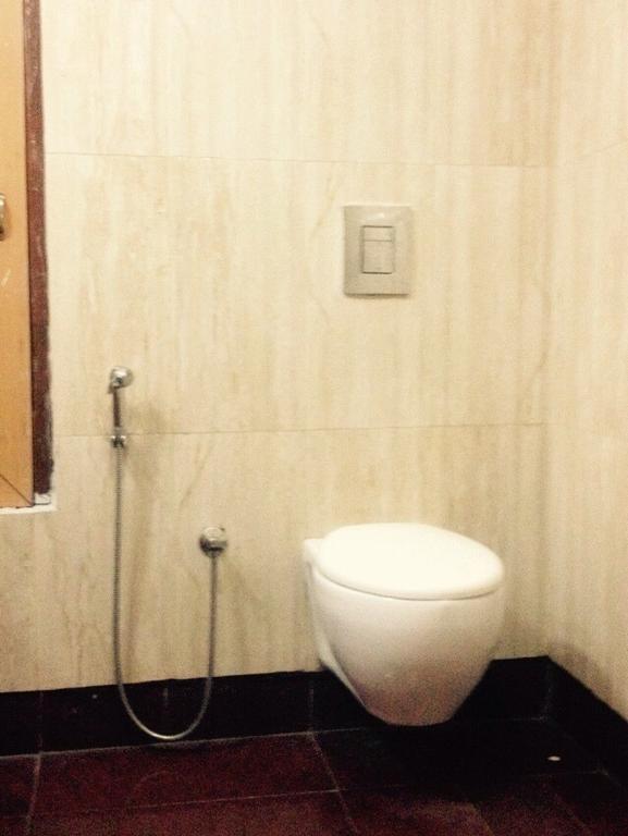 Hotel Bengal International Силигури Номер фото