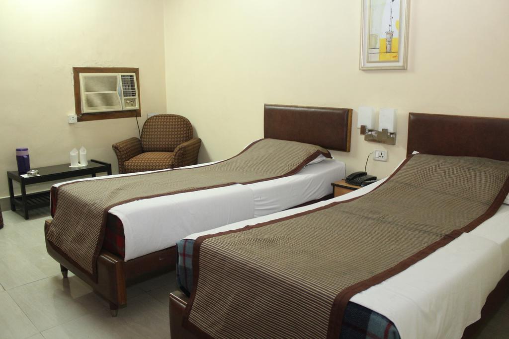 Hotel Bengal International Силигури Номер фото