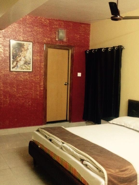 Hotel Bengal International Силигури Номер фото