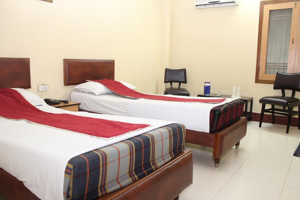 Hotel Bengal International Силигури Номер фото